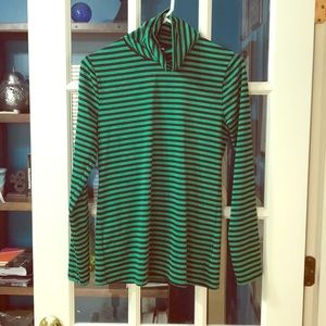 Form fitting stretch knit turtleneck